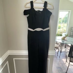 Formal black jumpsuit with added belt